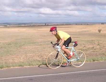 John Fleck riding his bicycling