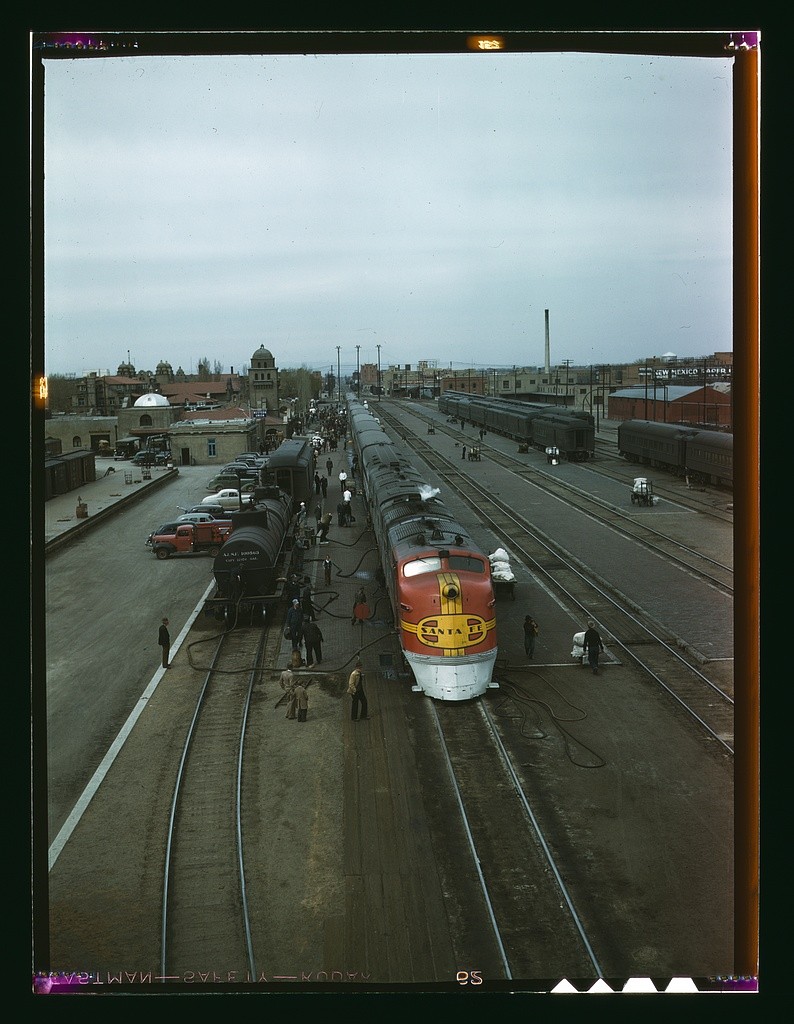 "Santa Fe R.R. streamliner, the "super Chief," being serviced at the depot, Albuquerque, N.M. Servicing of these diesel streamliners takes five minutes. " Photo by Jack Delano, courtesy Library of Congress