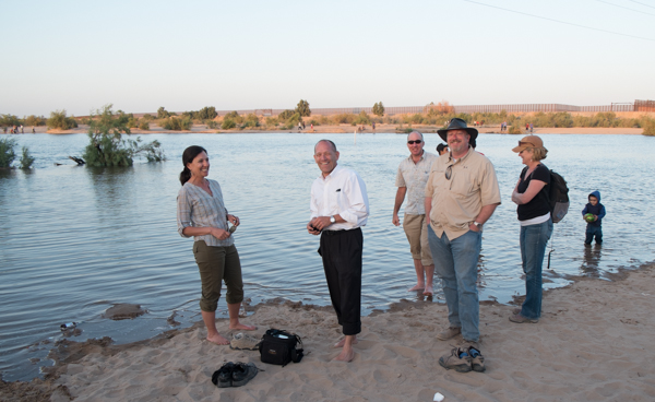 Jennifer Pitt, left, Mike Cohen (sunglasses, wading in the river) and friends on the Colorado River at San Luis, March 25, 2014, by John Fleck