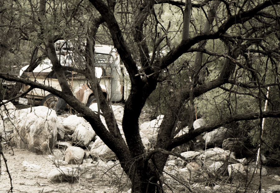 dead pickup truck in a desert arroyo, somewhere - anywhere - in the southwestern U.S.