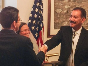 Estevan López, smiling after being sworn in as Comissioner of Reclamation