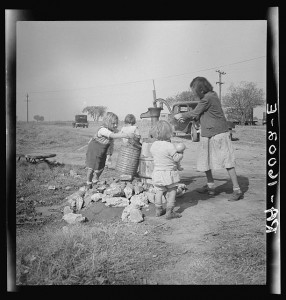 Water supply. Migratory camp for cotton pickers. San Joaquin Valley, California. American River camp. by Dorothea Lange, Farm Security Administration, 1936