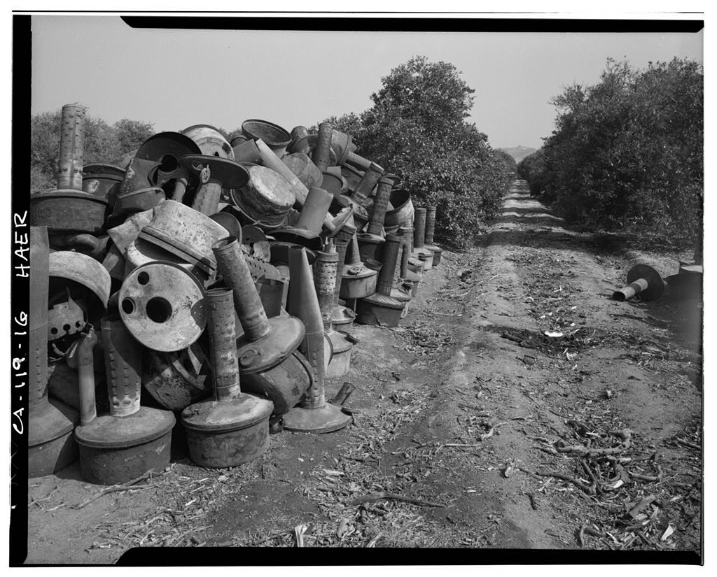  Smudge pots in orange grove on Victoria Avenue, Arlington Heights Citrus Landscape, Southwestern portion of city of Riverside, Riverside, Riverside County, CA, photo by Brian Grogan, courtesy Library of Congress