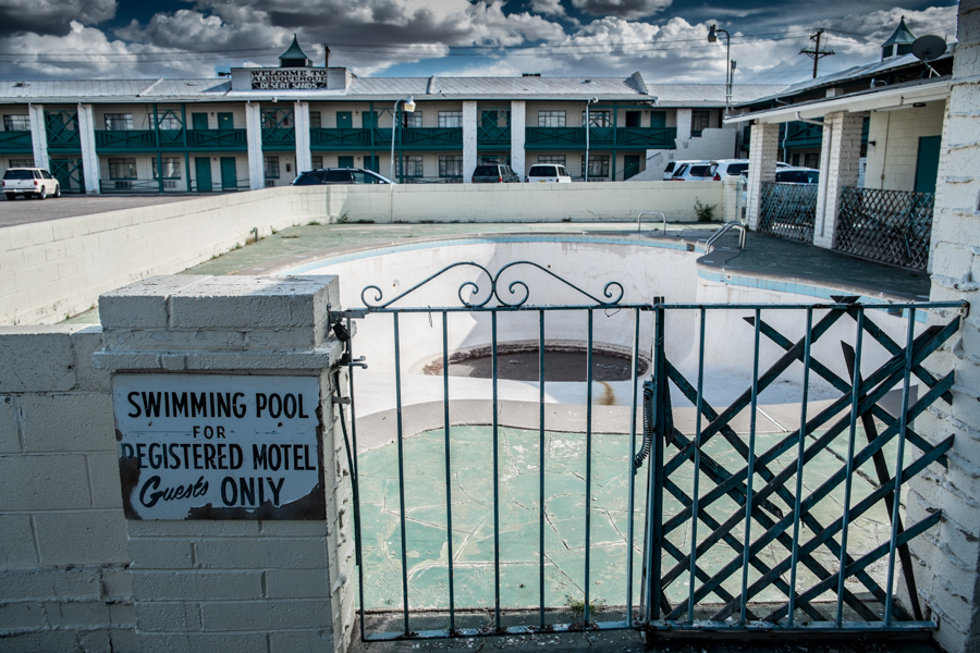 Welcome to Albuquerque, Desert Sands, swimming pool for registered guests only, by John Fleck