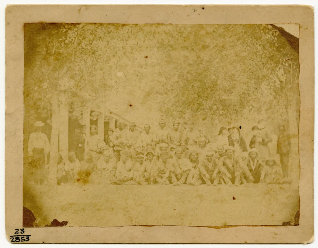 Faded image of men in the sun from the 1860s
