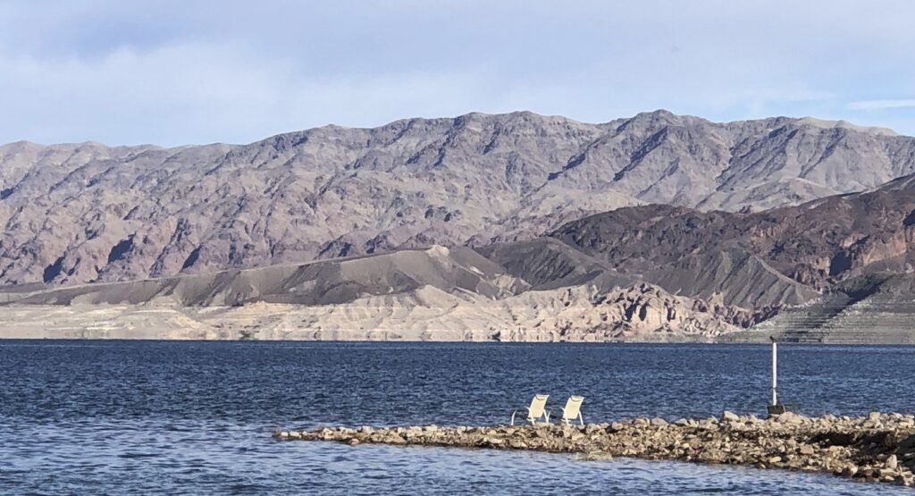 two lawn chairs on the Lake Mead shoreline